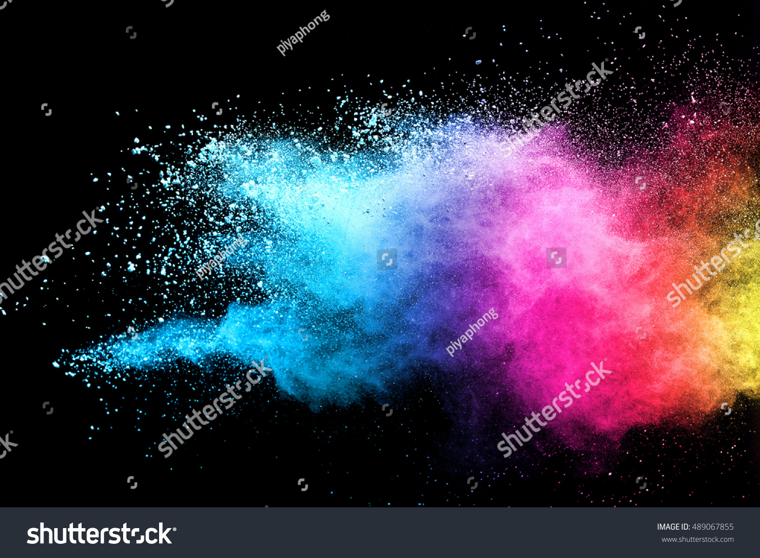 Freeze motion of blue and pink color powder exploding on black background. #489067855