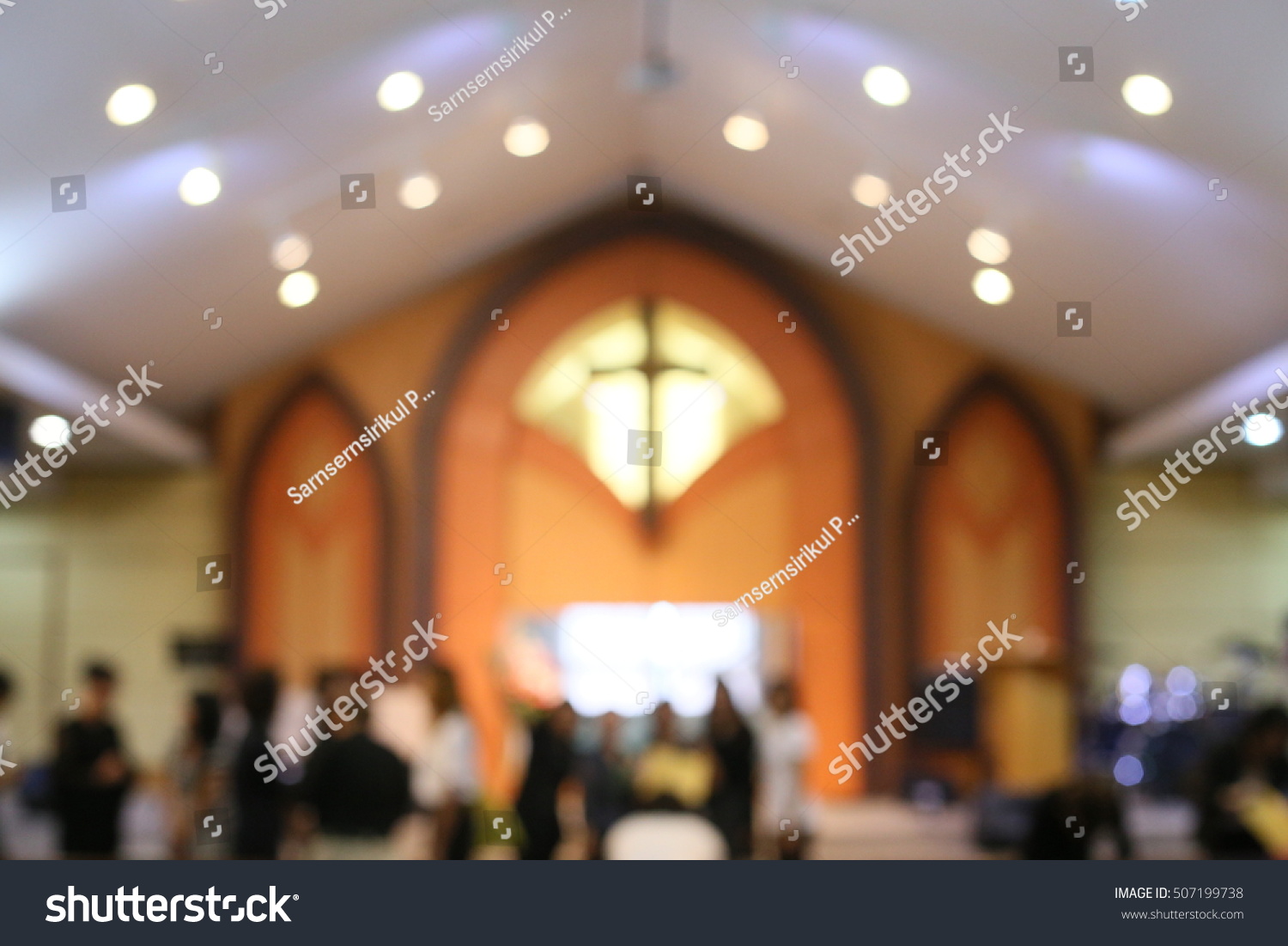 Blurred of Church interior with church cross #507199738