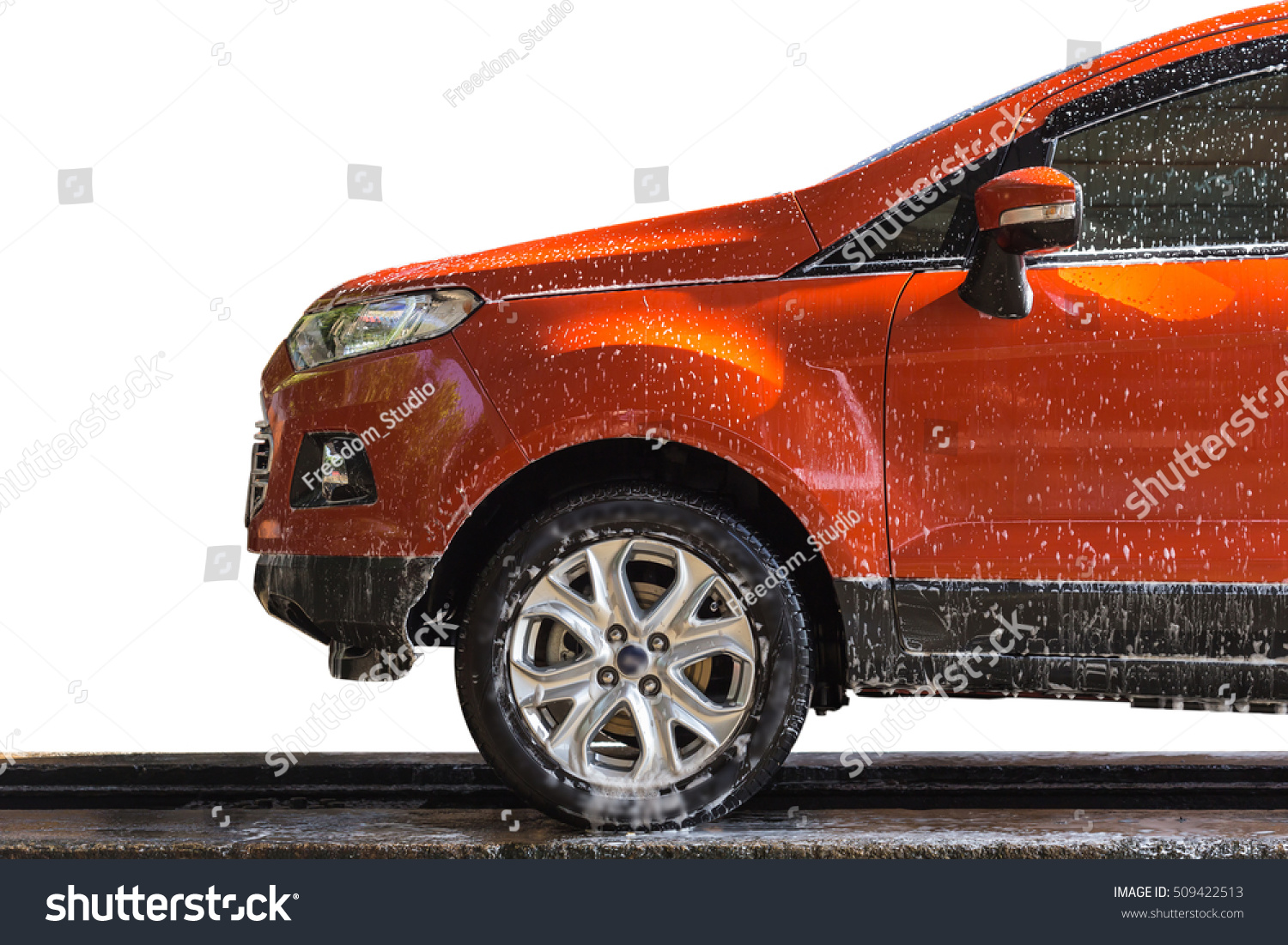 Orange car with white soap on the body in car care shop. Isolated on white background #509422513