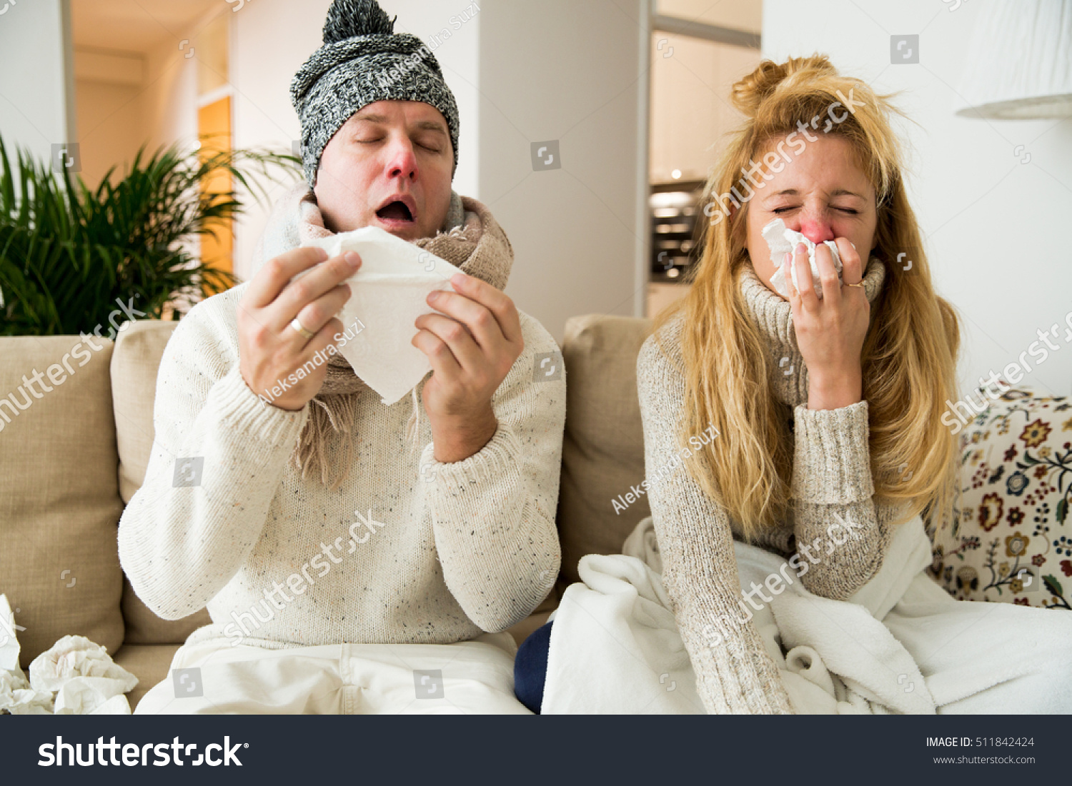 Sick couple catch cold. Man and woman sneezing, coughing. People got flu, having runny nose.
 #511842424