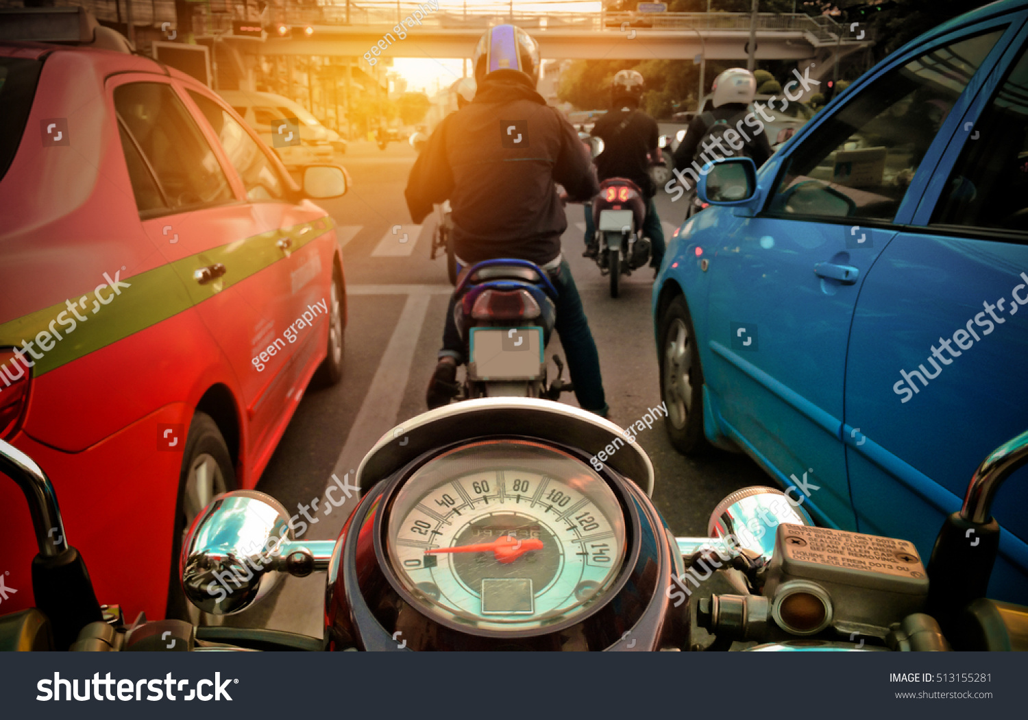 Behind the wheel of the motorcycle in the city #513155281