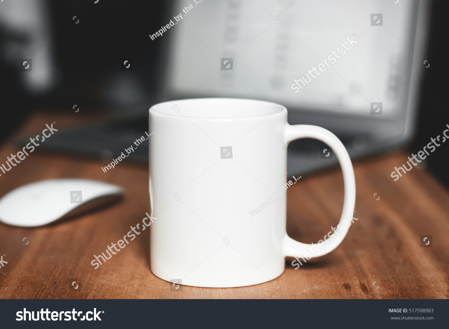 White mug on the desktop #517598983