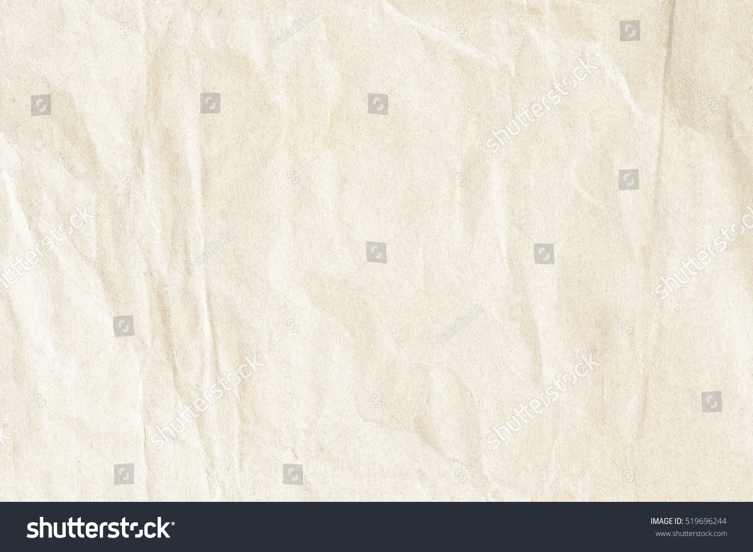 Brown crumpled paper texture #519696244