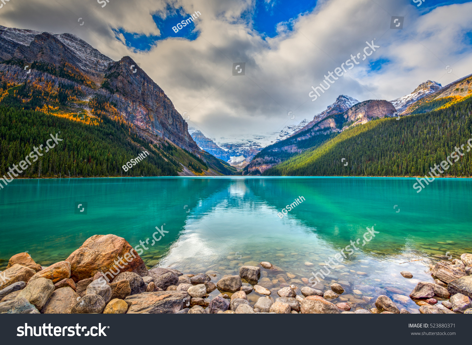 Beautiful autumn views of iconic Lake Louise in Banff National Park in the Rocky Mountains of Alberta Canada #523880371