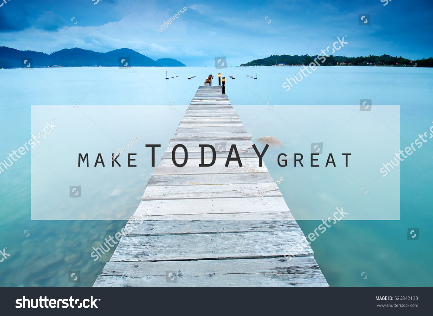 Inspirational motivating quote on long exposure of wooden jetty at sea facing island with cloud and sky at twilight. make today great #526842133