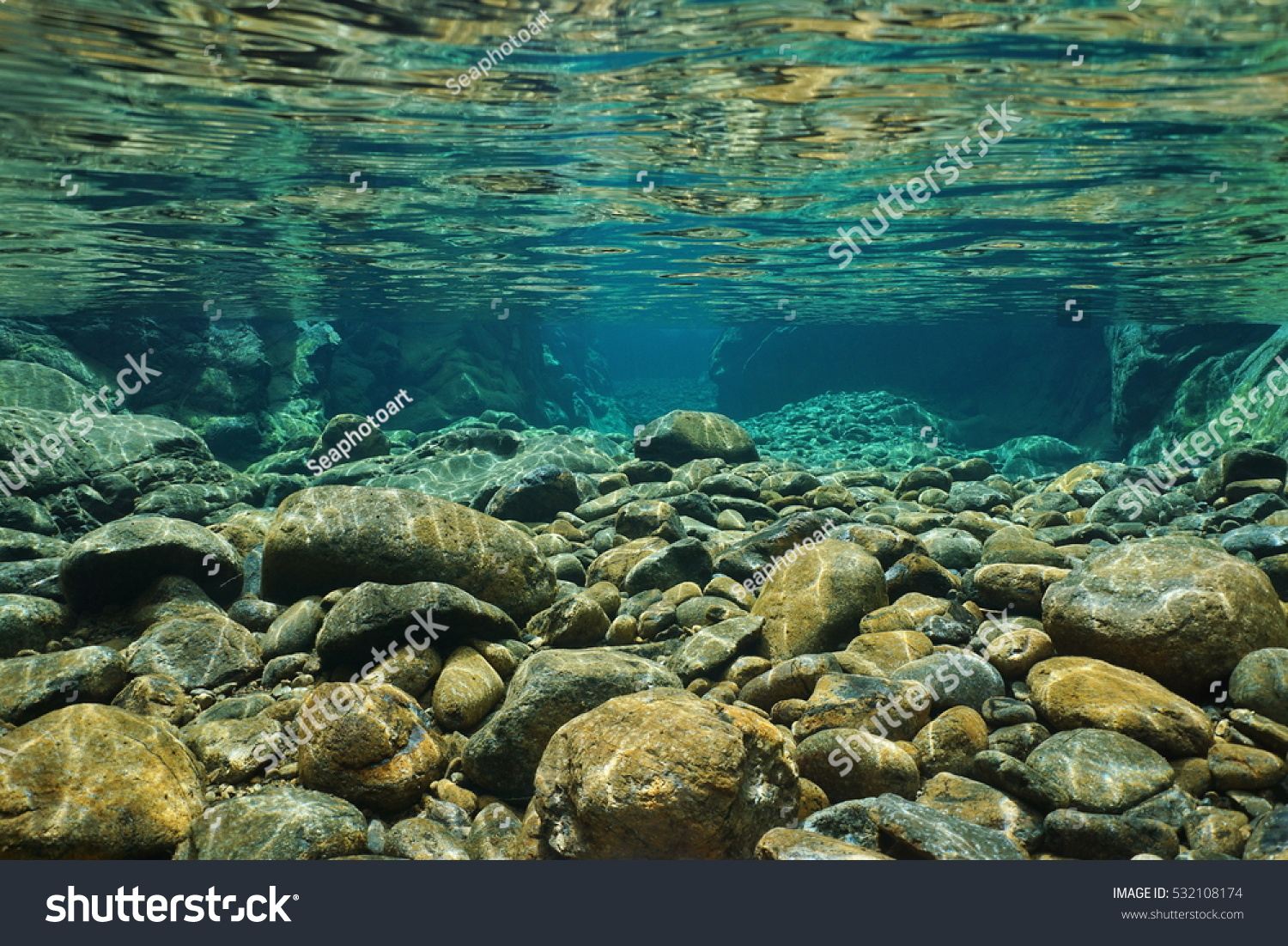 Rocks underwater on riverbed with clear freshwater, Dumbea river, Grande Terre, New Caledonia #532108174