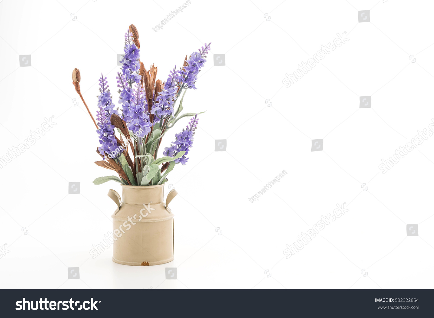 statice and caspia flower in vase on the table #532322854