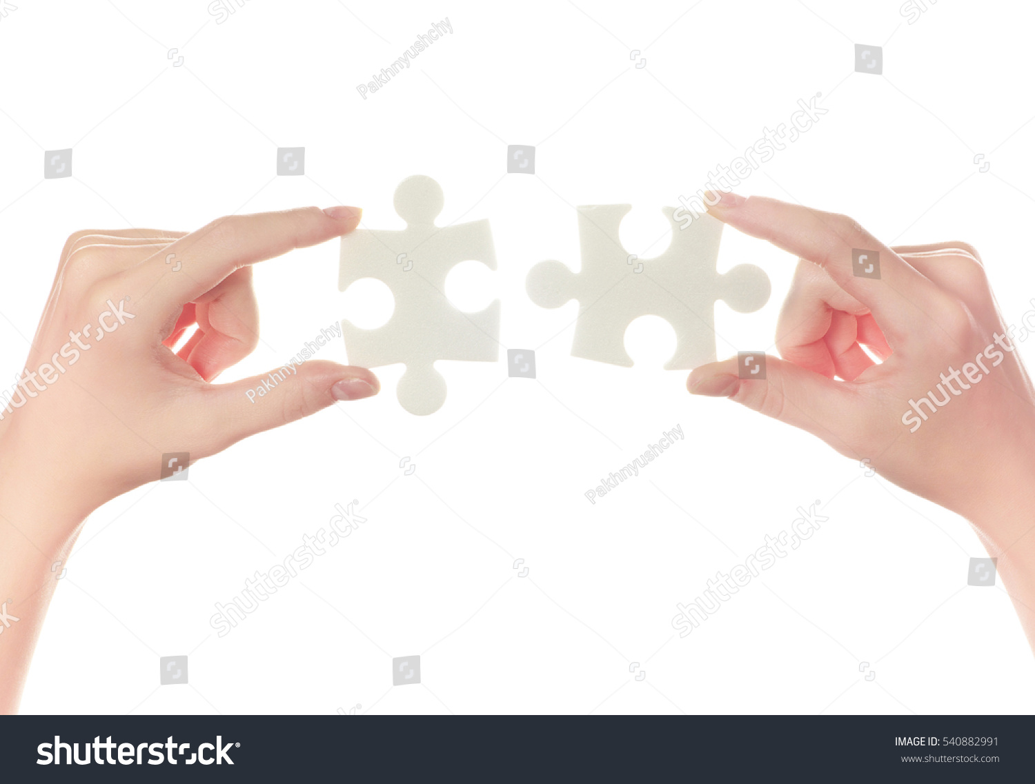 puzzle in hand isolated on white background #540882991
