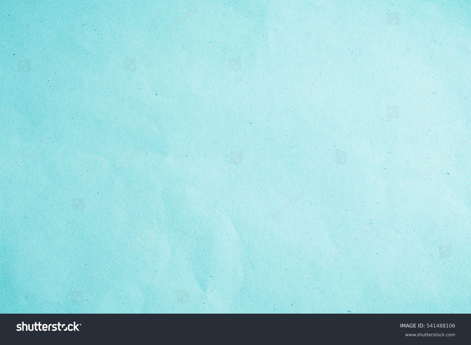 Smooth flat vintage paper bag pale texture in light blue color on table background. Organic soft turquoise plain back craft book concept for simplicity azure teal scrap backdrop, black simple surface #541488106