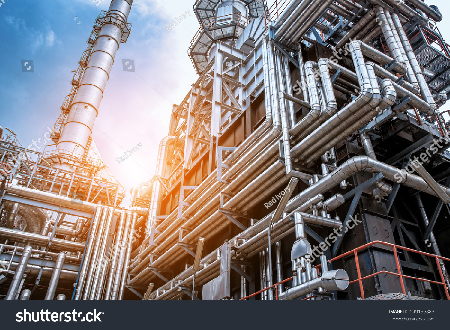 Close up Industrial view at oil refinery plant form industry zone with sunrise and cloudy sky #549195883