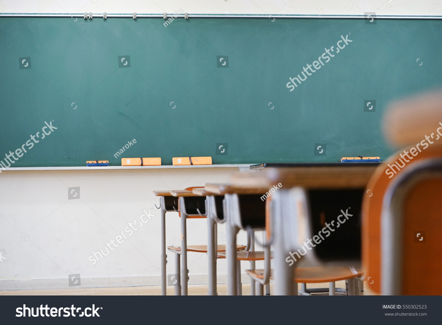 School classroom with blackboard #550302523