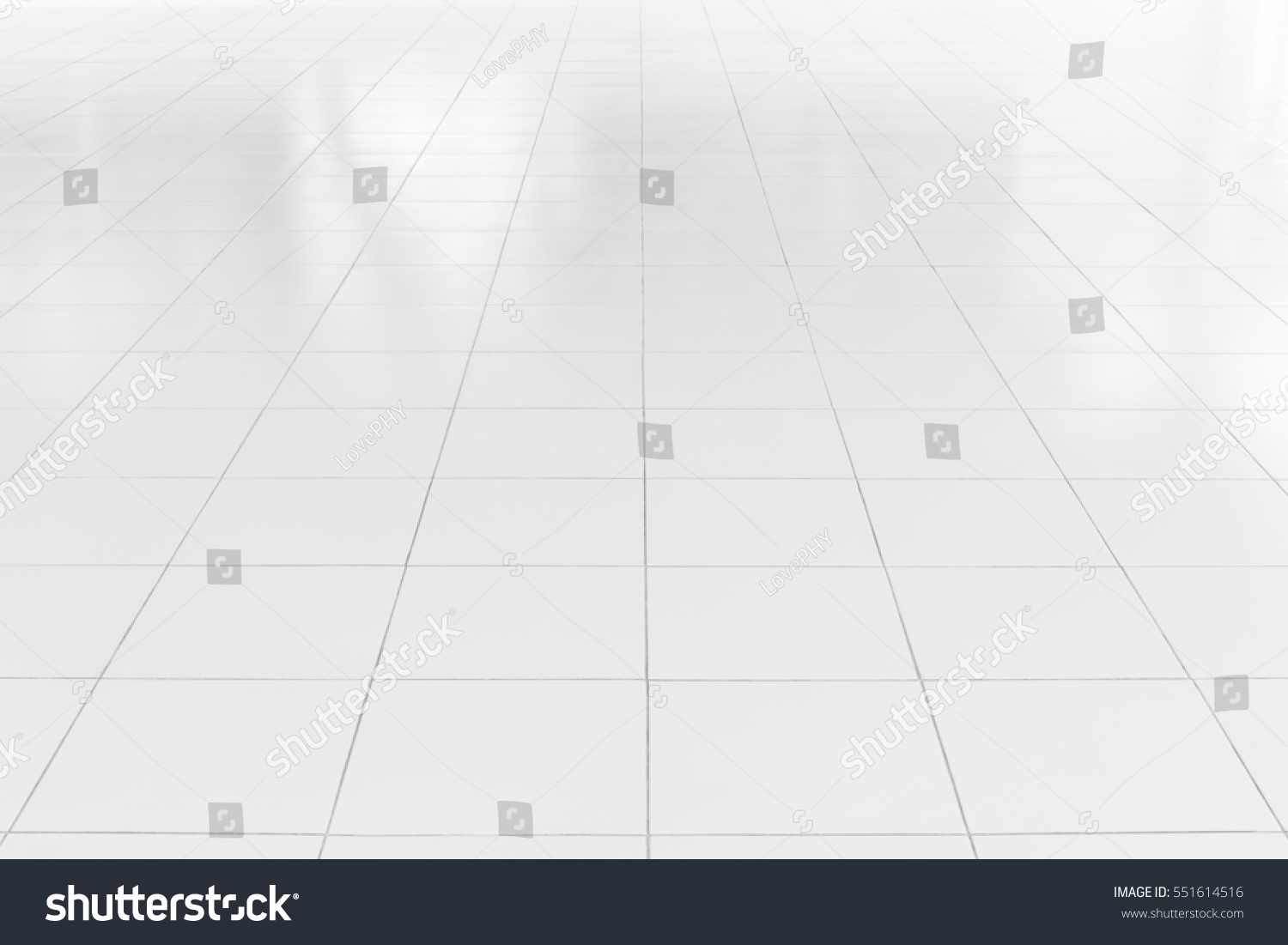 White tile floor background in perspective view. Clean surface and symmetry with grid line texture or pattern. For decoration in bathroom, kitchen and laundry room. #551614516