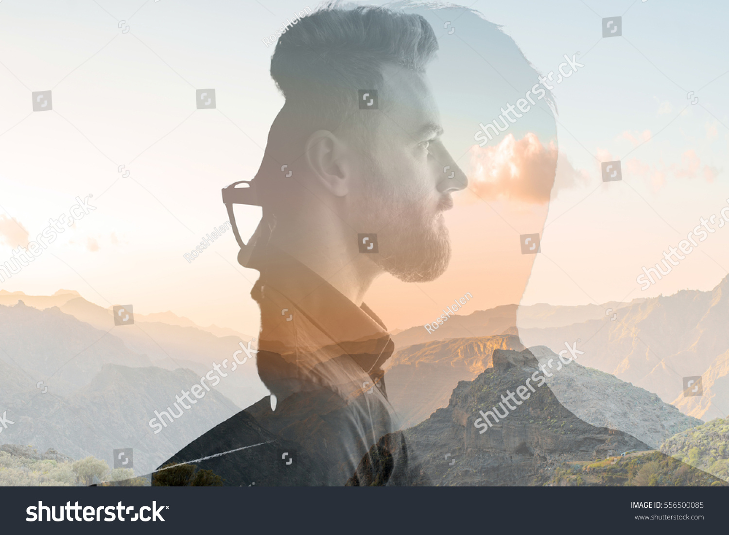 Triple exposure portrait of a businessman combinated with beautiful mountain landscape on the sunset #556500085