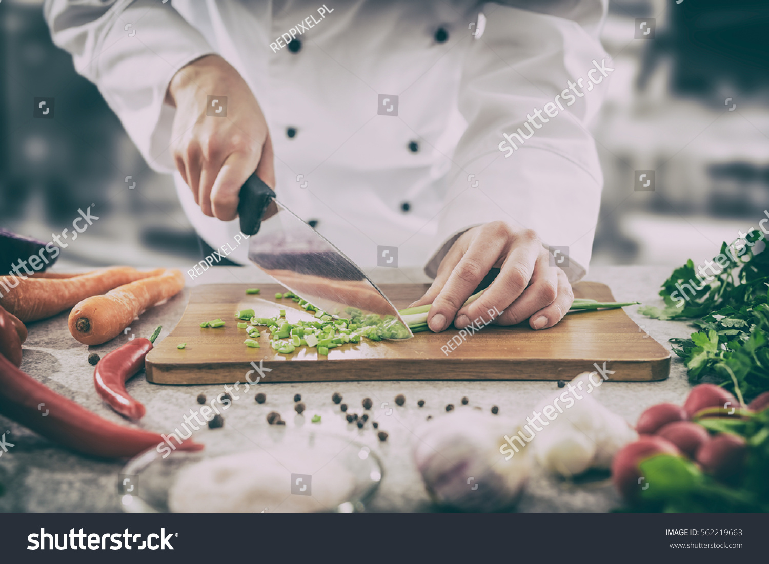 chef cooking food kitchen restaurant cutting cook hands hotel man male knife preparation fresh preparing concept - stock image #562219663
