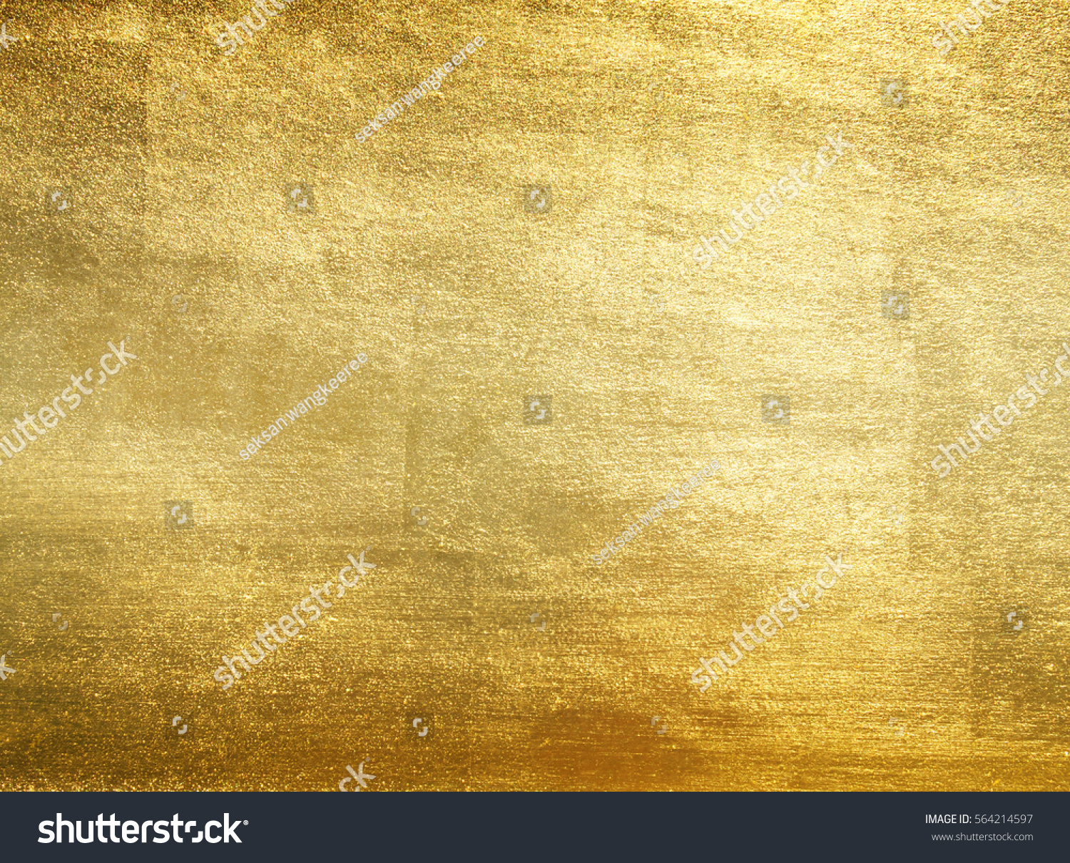 Shiny yellow leaf gold foil texture background #564214597