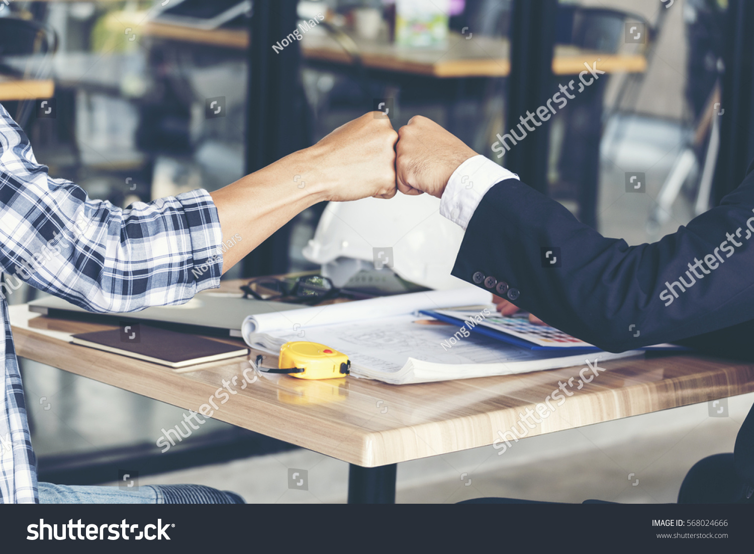Partner Business Trust Teamwork Partnership. Industry contractor fist bump dealing mission business. Mission team meeting group of People Fist bump Hands together. Business industry trust teamwork #568024666