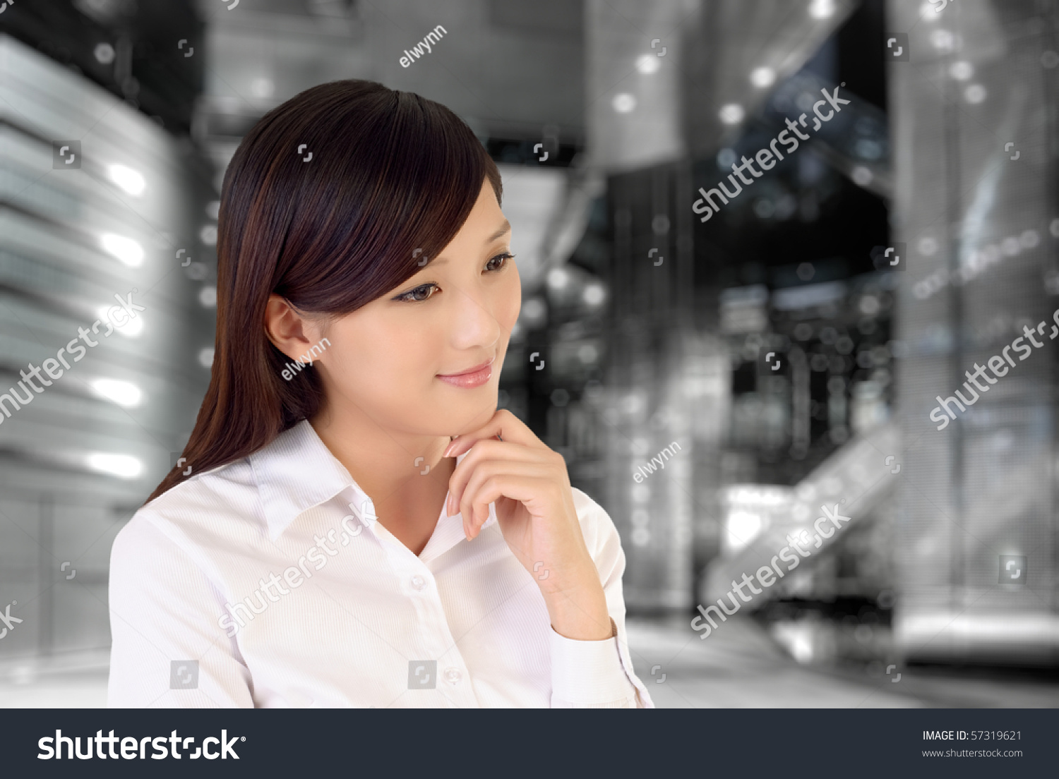 Businesswoman thinking inside of modern architecture, closeup portrait of oriental office lady. #57319621