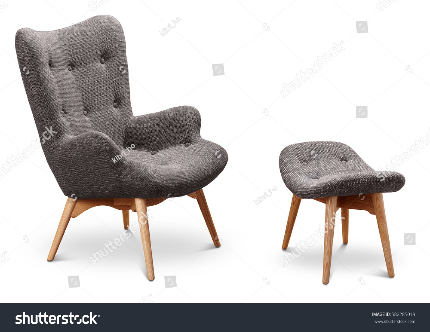 Gray color armchair and small chair for legs. Modern designer armchair on white background. Textile armchair and chair. Series of furniture. #582285019