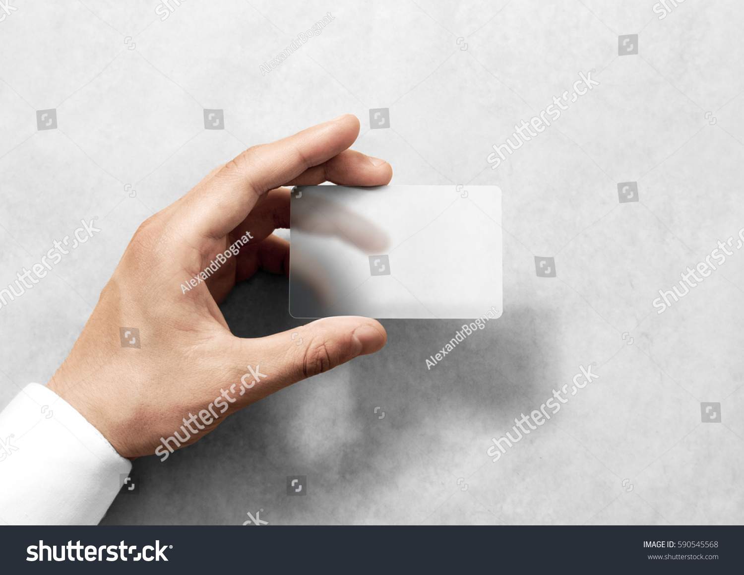 Hand hold blank translucent card mockup with rounded corners. Plain clear call-card mock up template holding arm. Plastic transparent acrylic namecard display front. #590545568