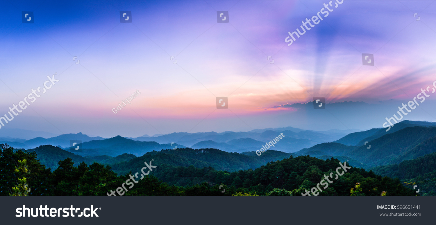 Morning view with sun-ray in national park with foggy environment. #596651441