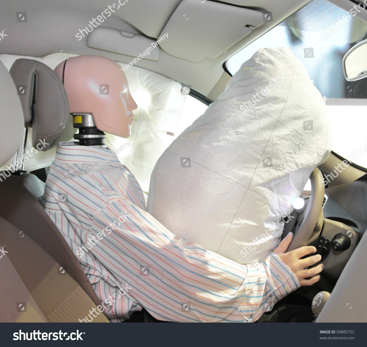 The image of mannequin in a car after crash-test #59885752