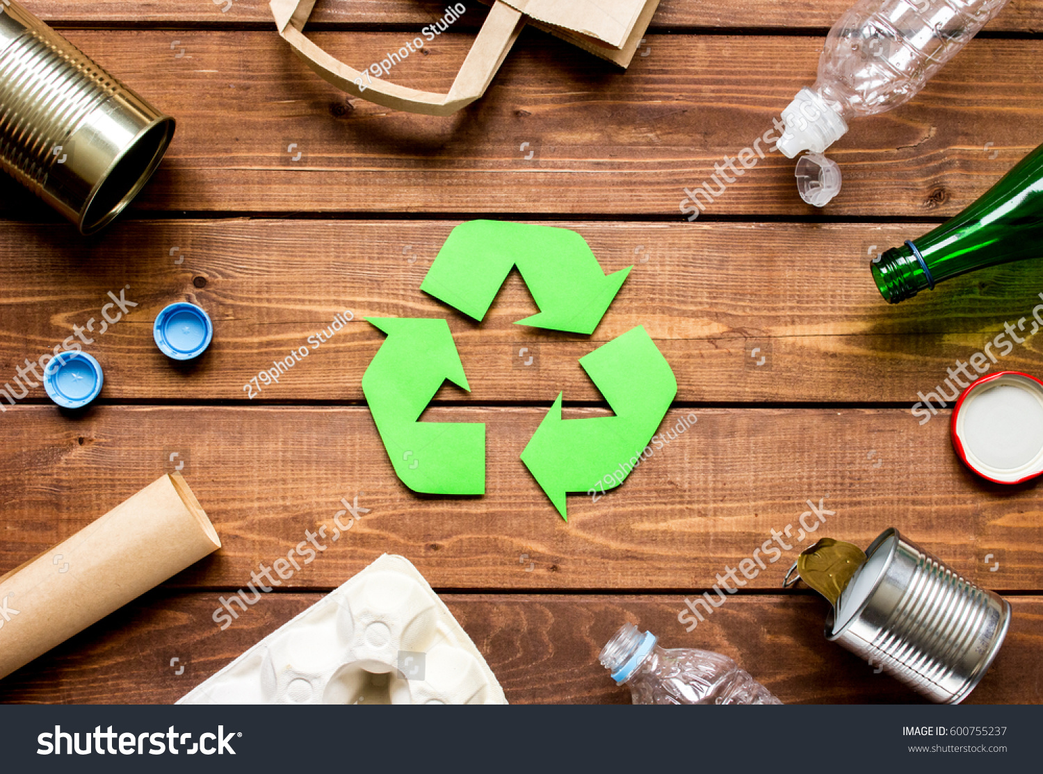 Eco concept with recycling symbol on table background top view #600755237