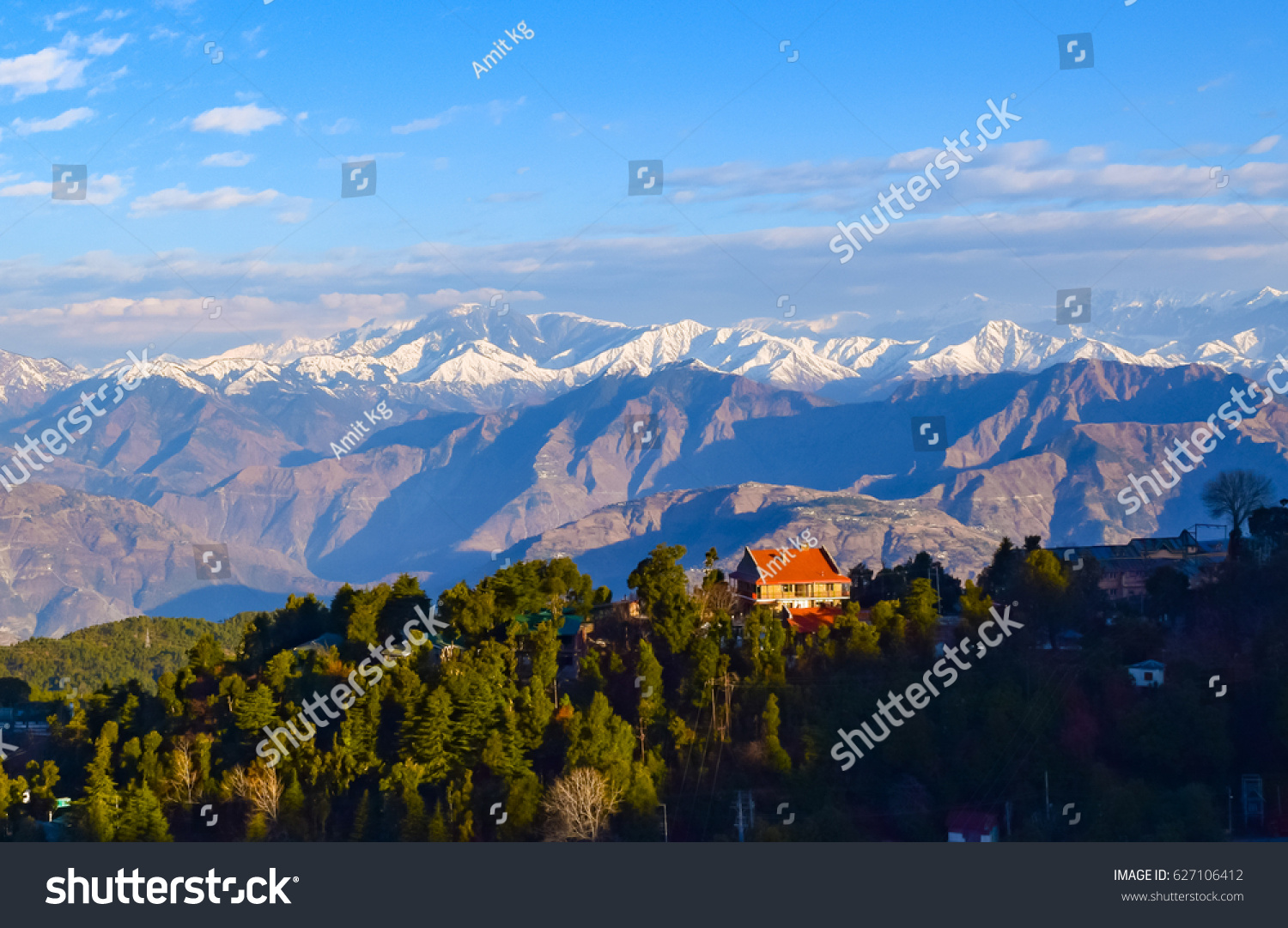 Spectacular mountains-cape of Pir-Panjal Himalayan range on a winter morning from Dalhousie hill station of Himachal Pradesh nestled in Indian Himalayas. #627106412