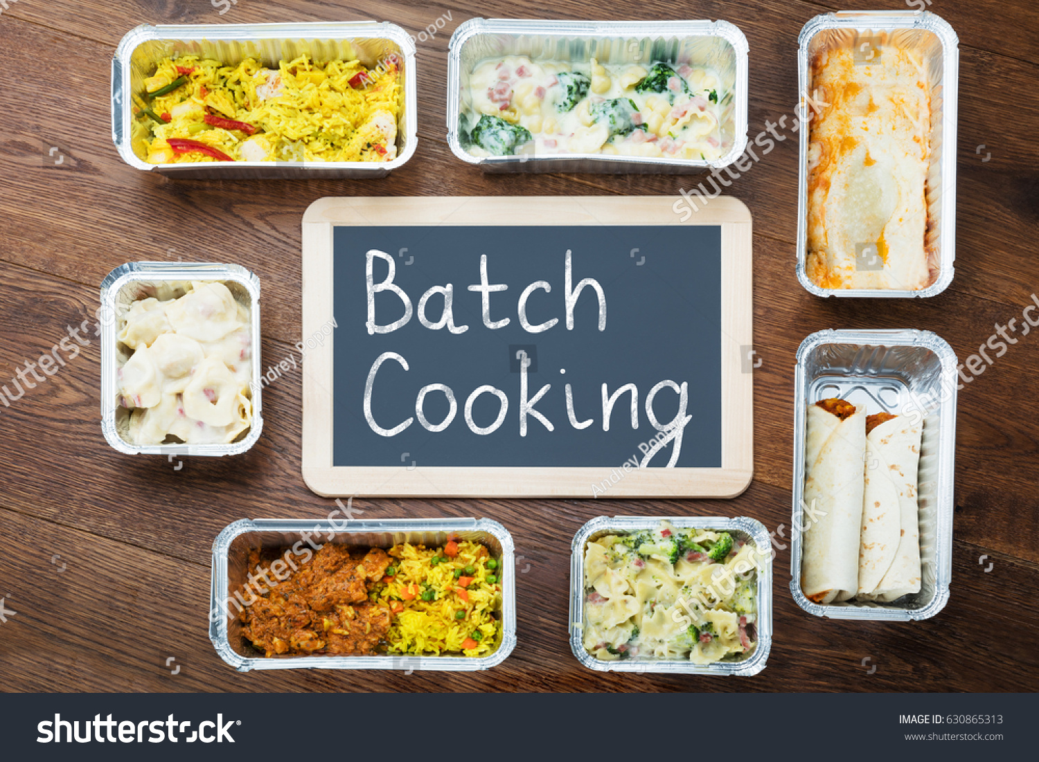 Batch Cooking Text Written On Slate With Take Away Dishes In Foil Container On Table #630865313