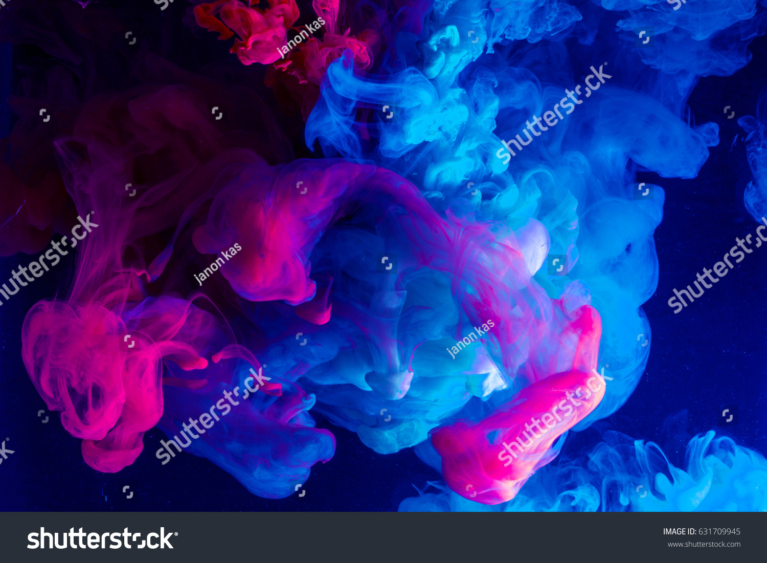 Motion Color drop in water,Ink swirling in ,Colorful ink abstraction.Fancy Dream Cloud of ink under water #631709945