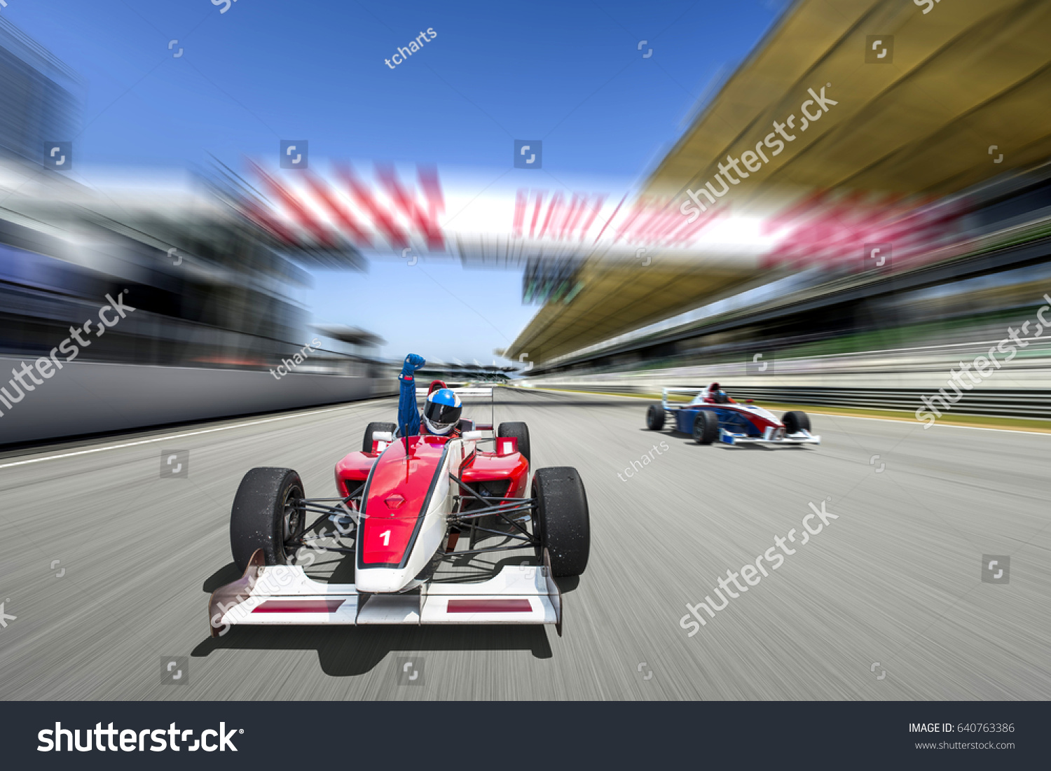 driver celebrate victory pass the finishing point and Race car racing on a track with motion blur. #640763386