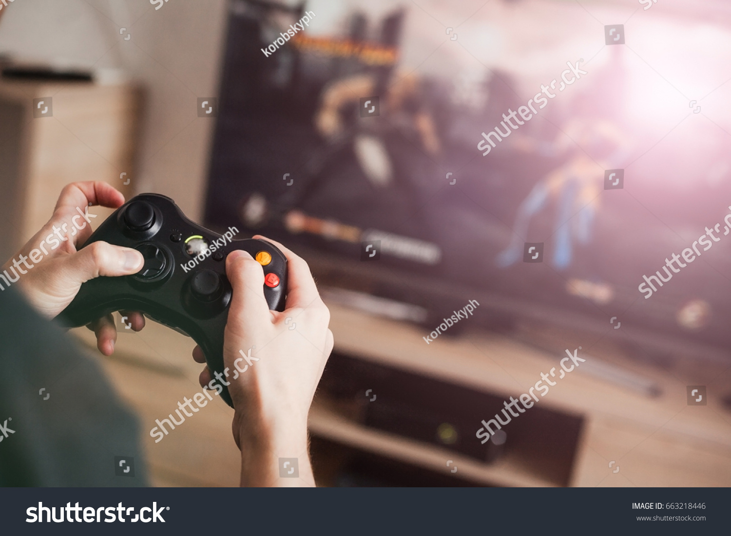 The guy is playing on the console #663218446