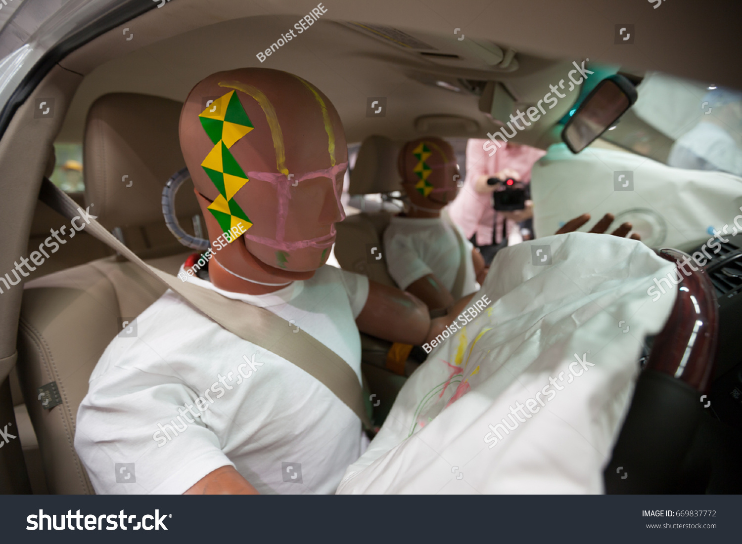 Crash Test Dummies in a car after a Crash Test. #669837772