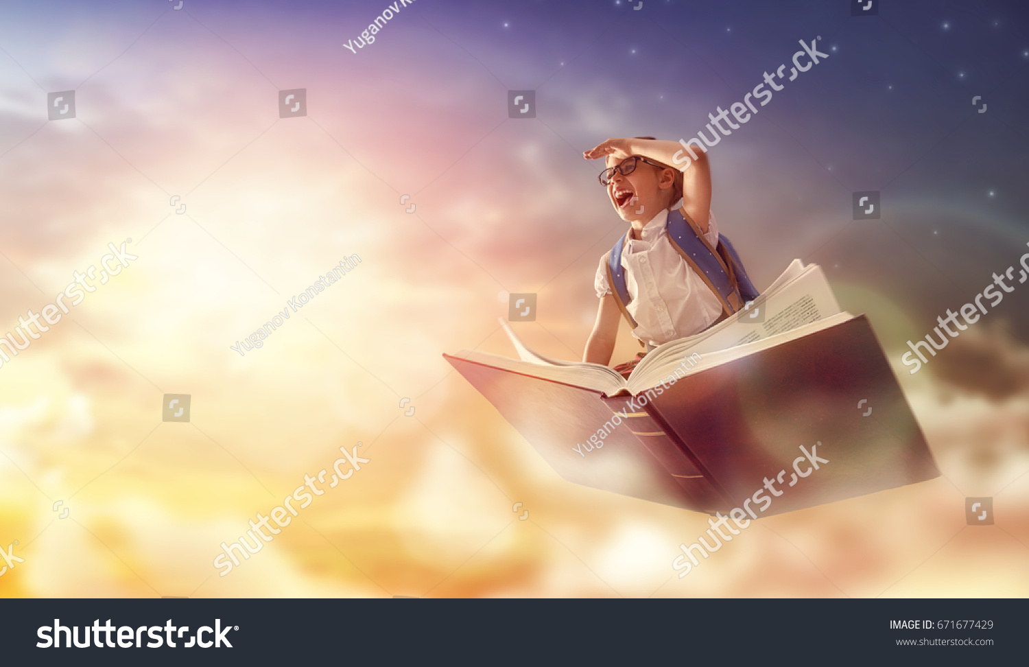 Back to school! Happy cute industrious child flying on the book on background of sunset sky. Concept of education and reading. The development of the imagination. #671677429