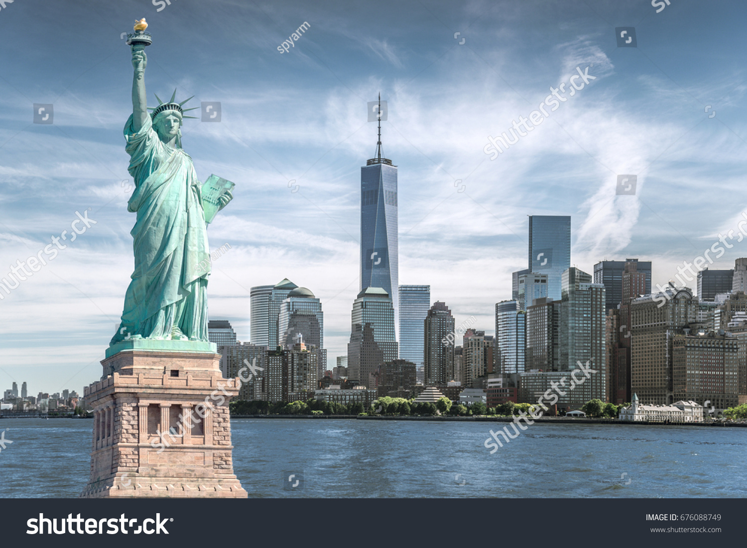 The statue of Liberty with World Trade Center background, Landmarks of New York City #676088749