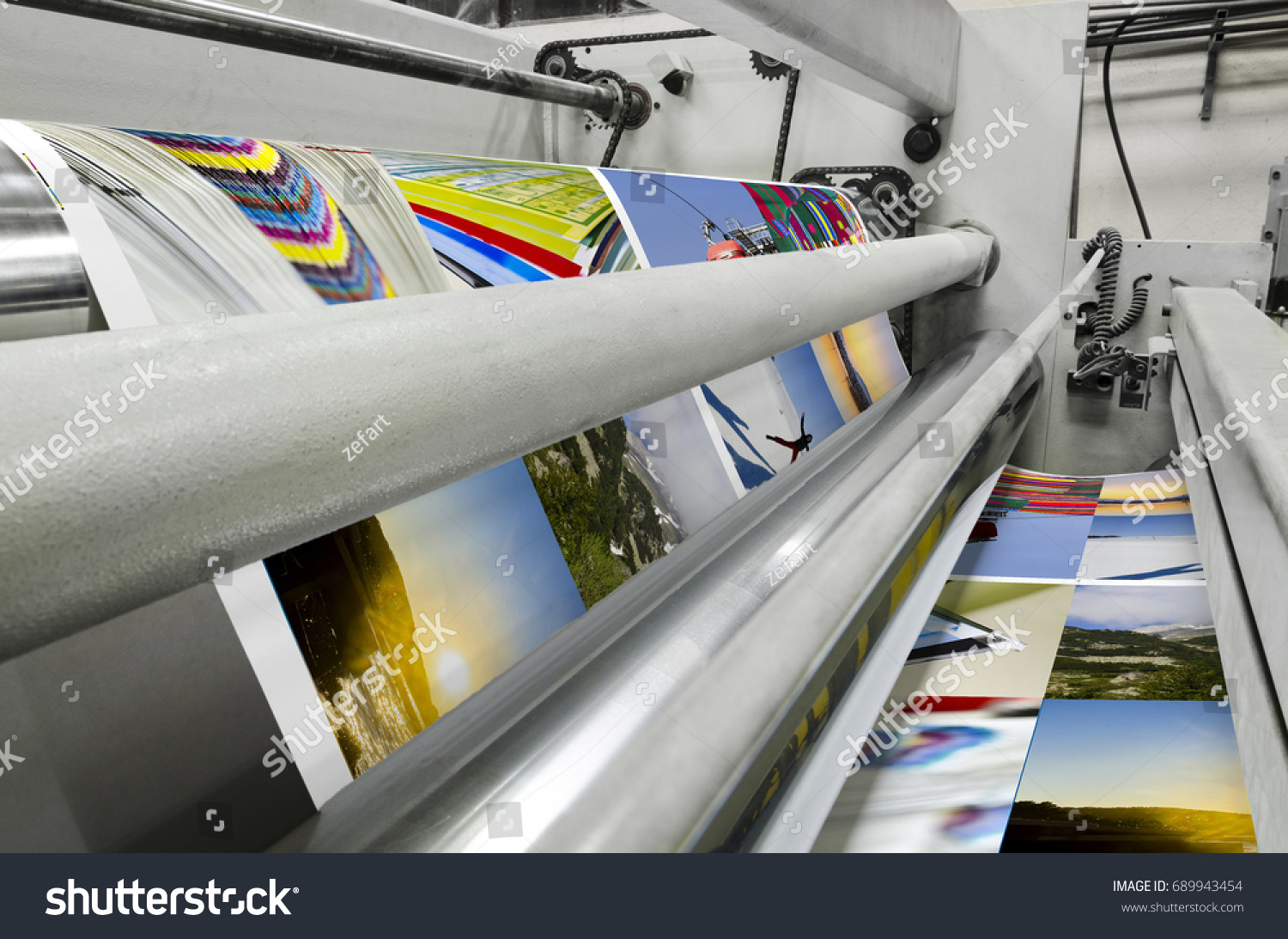 Printing machine fast roll movement during magazine print #689943454