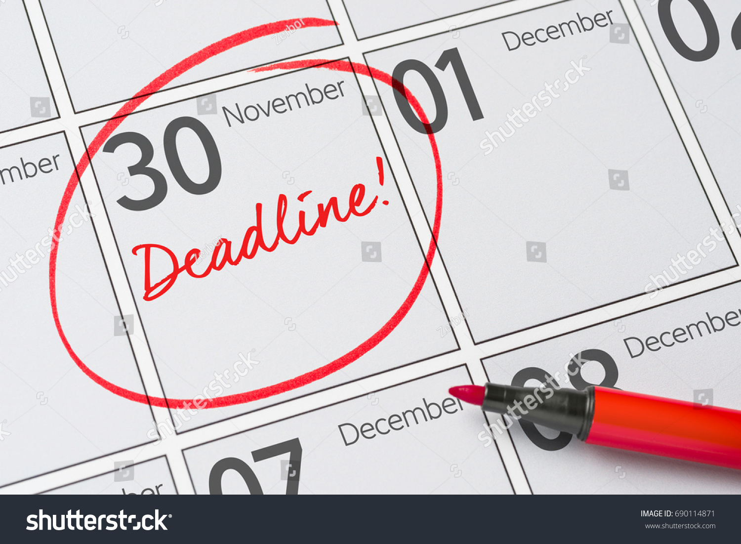 Deadline written on a calendar - November 30 #690114871
