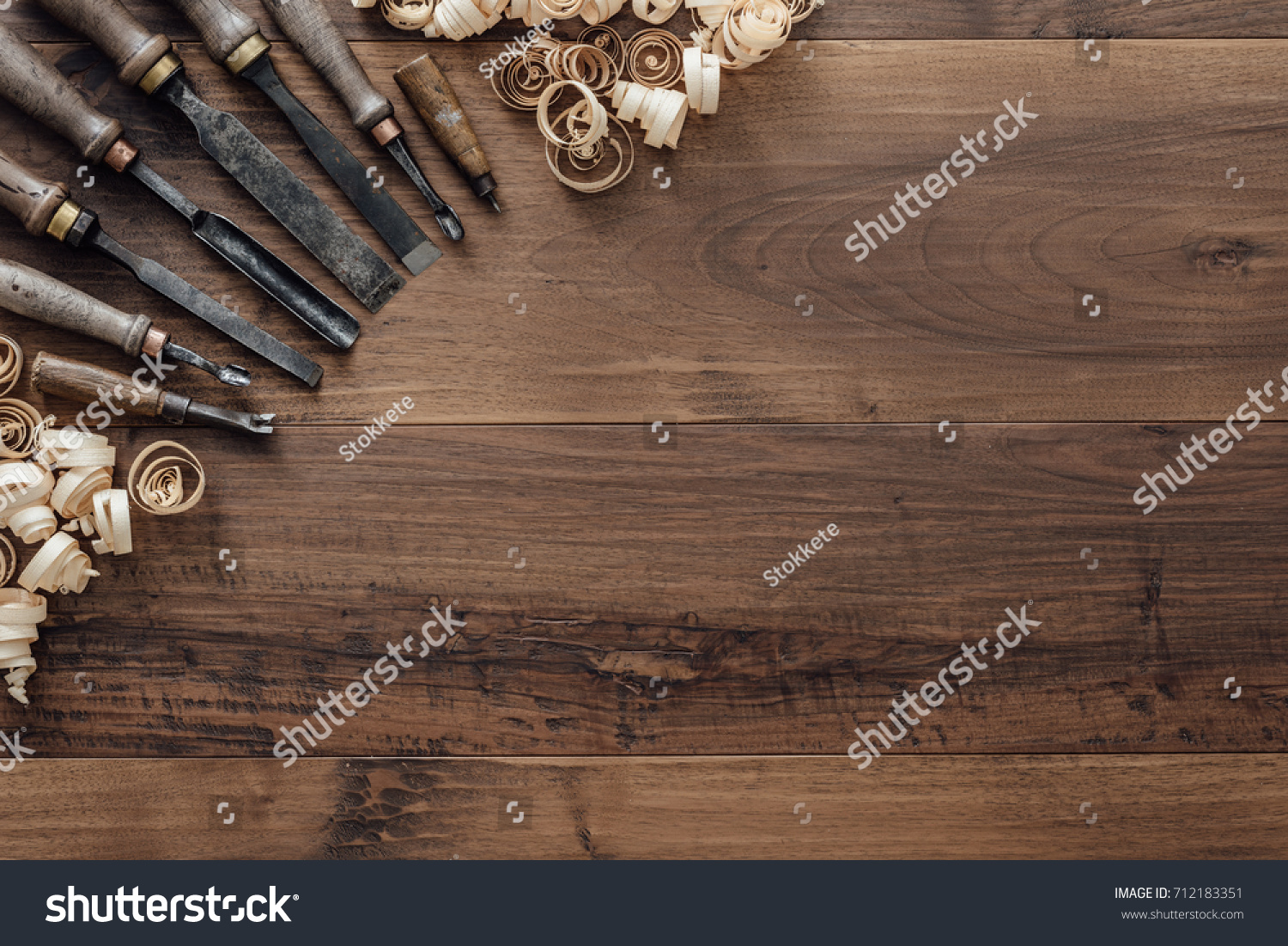Old carpentry tools on a workbench and blank copyspace: woodworking, craftsmanship and handwork concept, flat lay #712183351