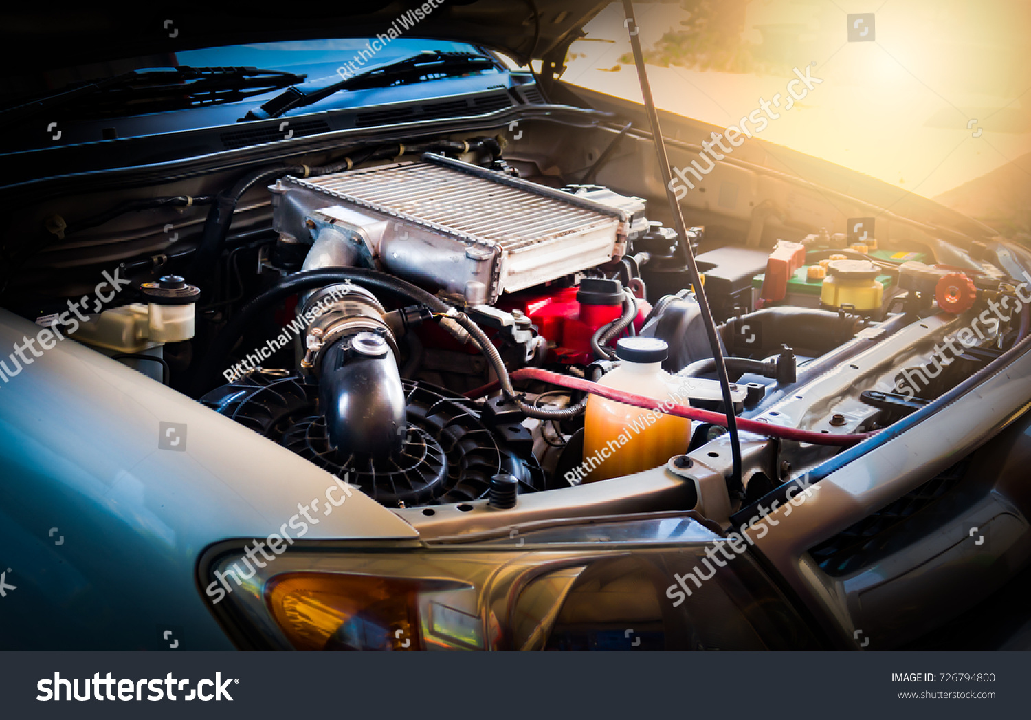 Car crash open hood car mechanic to check condition of damage. See the radiator cooling panel Engine and electronic system for mechanic to check damage thoroughly to repair engine to complete for use. #726794800