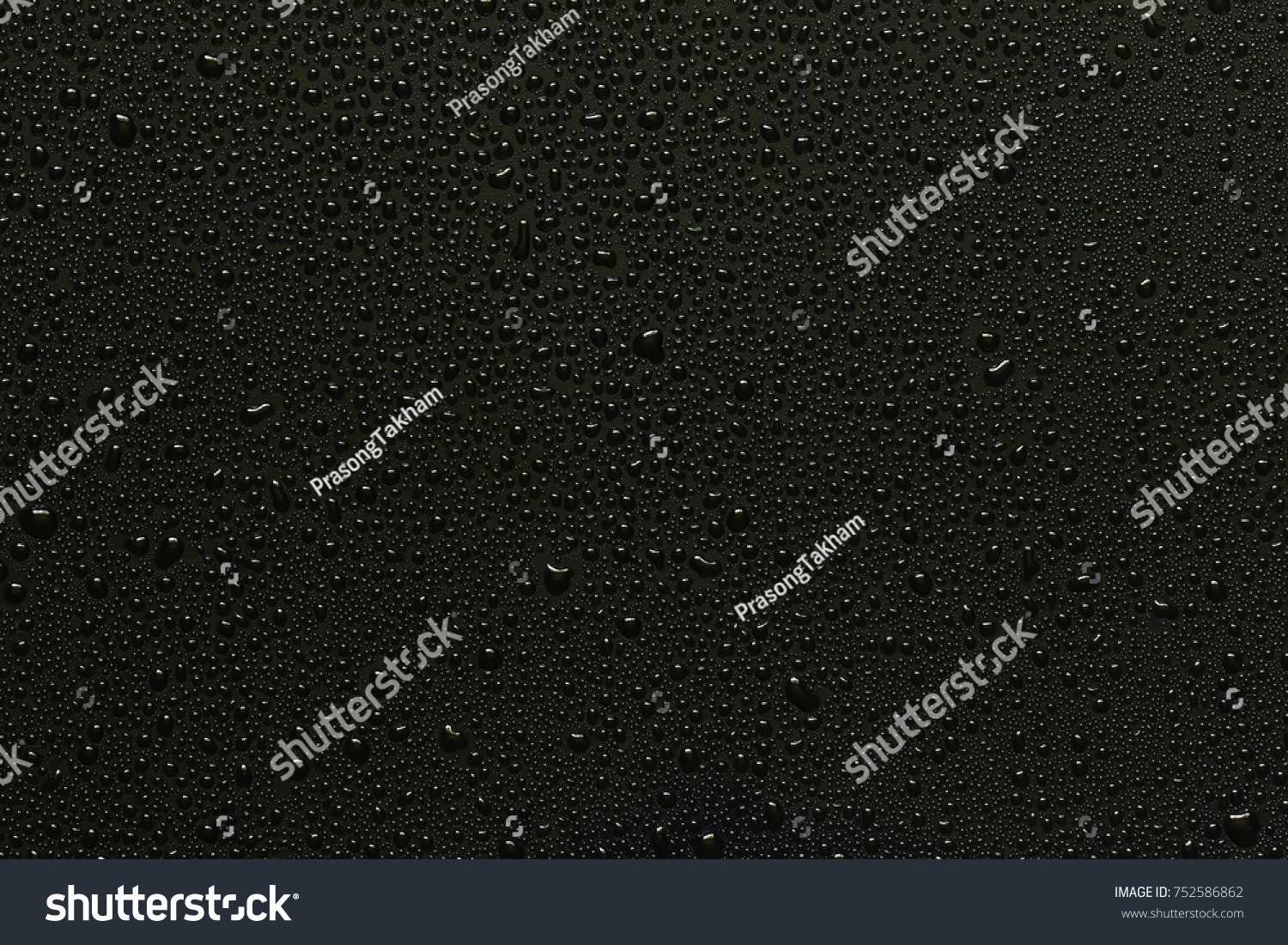 Water droplets on black background #752586862