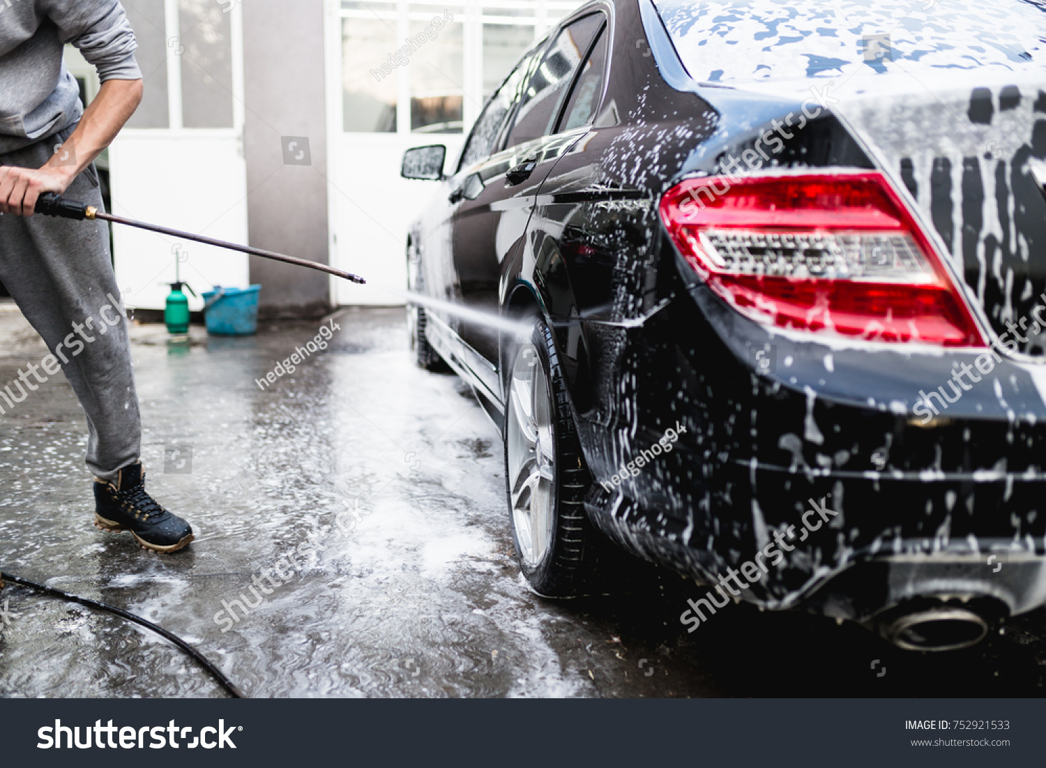 Car washing. Cleaning Car Using High Pressure Water.  #752921533