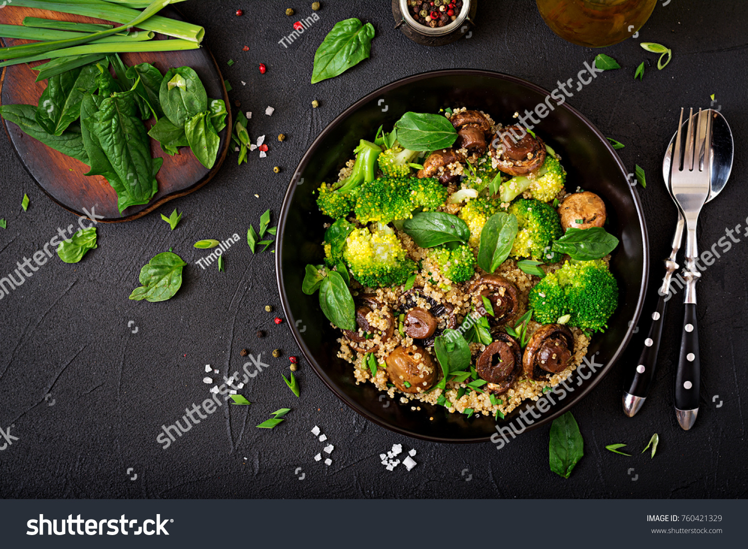 Dietary menu. Healthy vegan salad of vegetables - broccoli, mushrooms, spinach and quinoa in a bowl. Flat lay. Top view #760421329