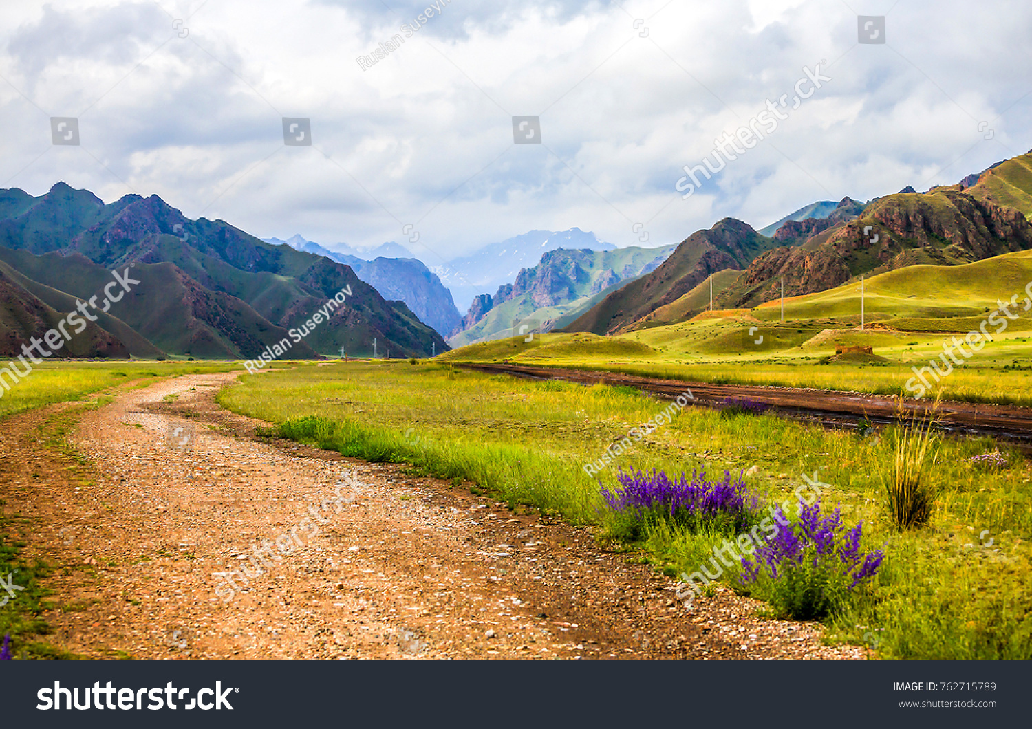 Mountain road on summer landscap #762715789