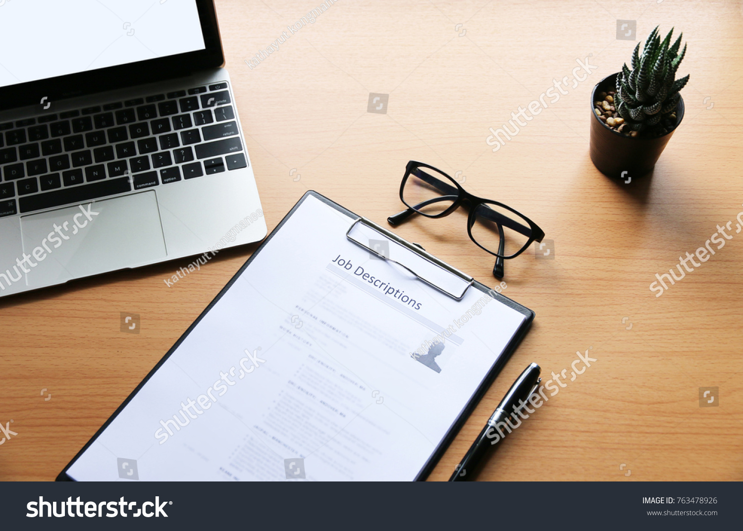 businessman Reading job description paper In office. #763478926