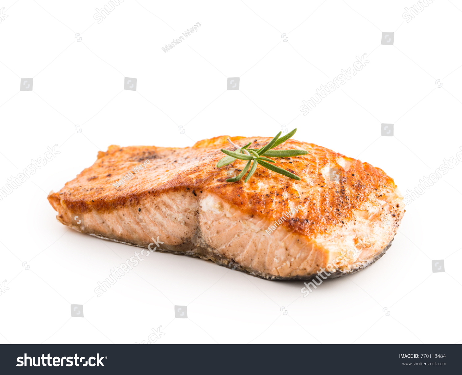 Salmon roast steak isolated on white background. #770118484