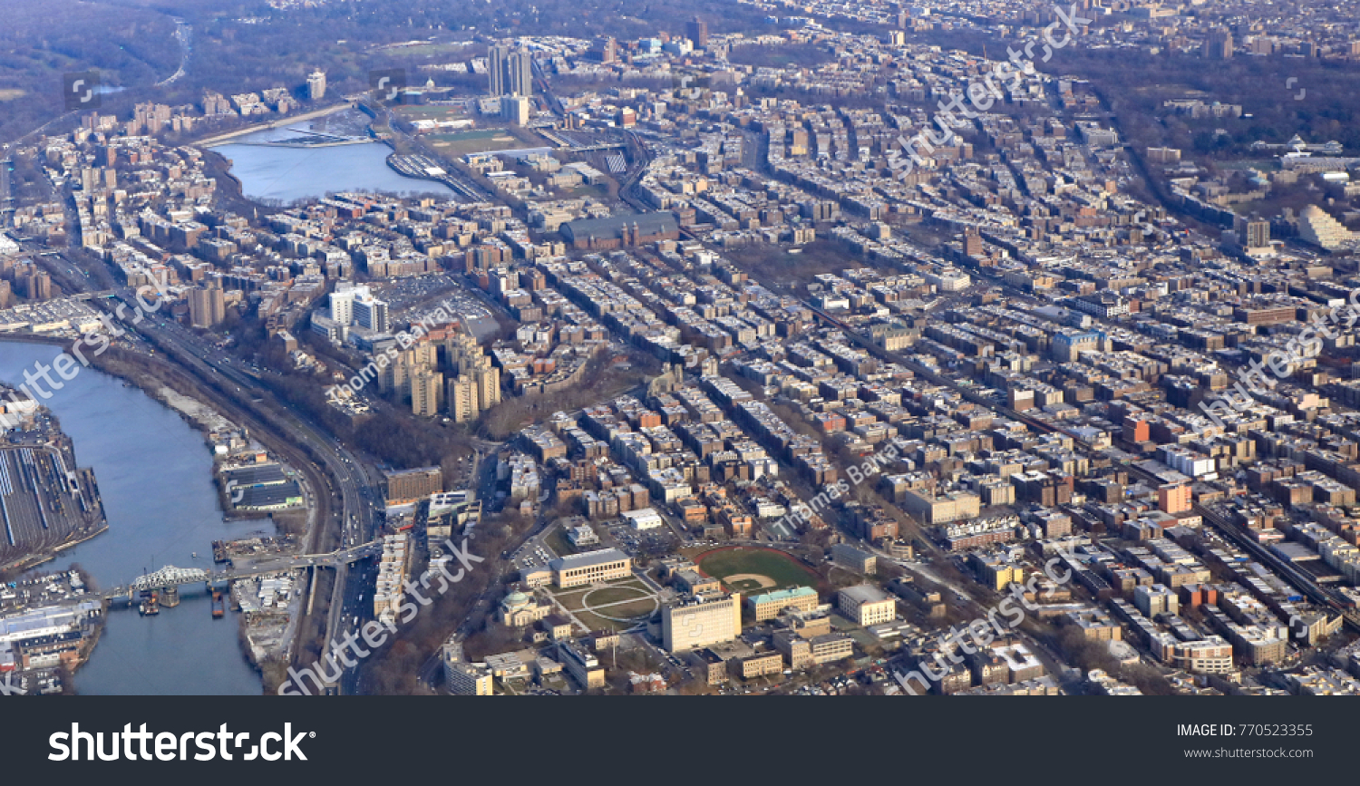 Aerial view of the Bronx in New York City, with Fordham and Kingsbridge plus the Harlem River. #770523355