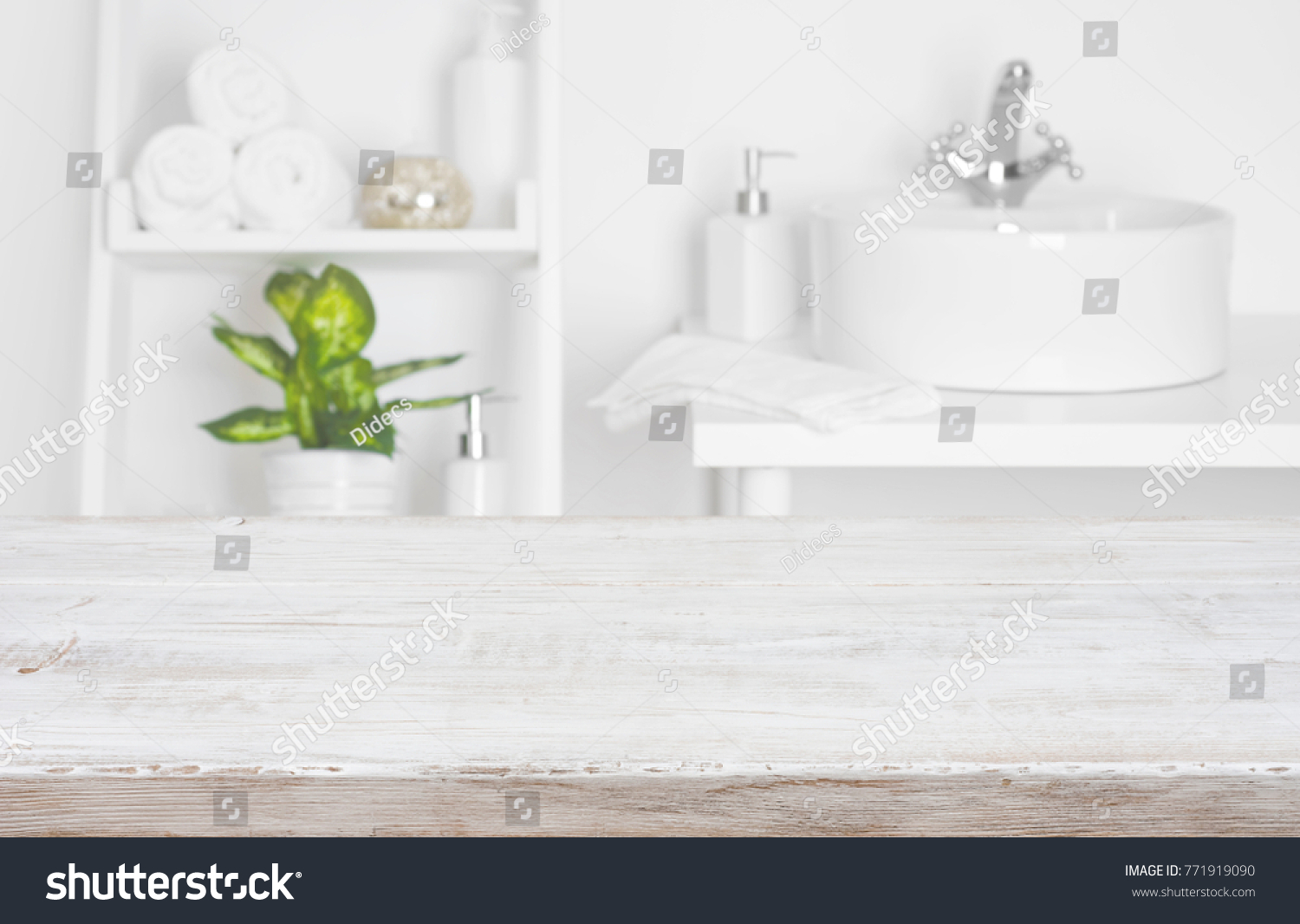 Wooden table over blurred spa salon bathroom shelves background #771919090