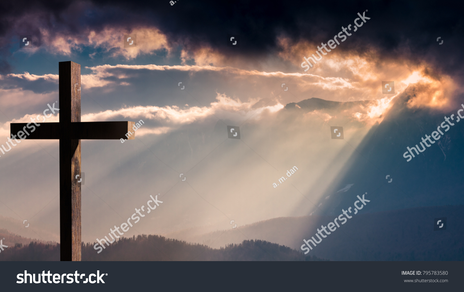 Jesus Christ cross. Easter, resurrection concept. Christian wooden cross on a background with dramatic lighting, colorful mountain sunset, dark clouds and sky, sunbeams  #795783580