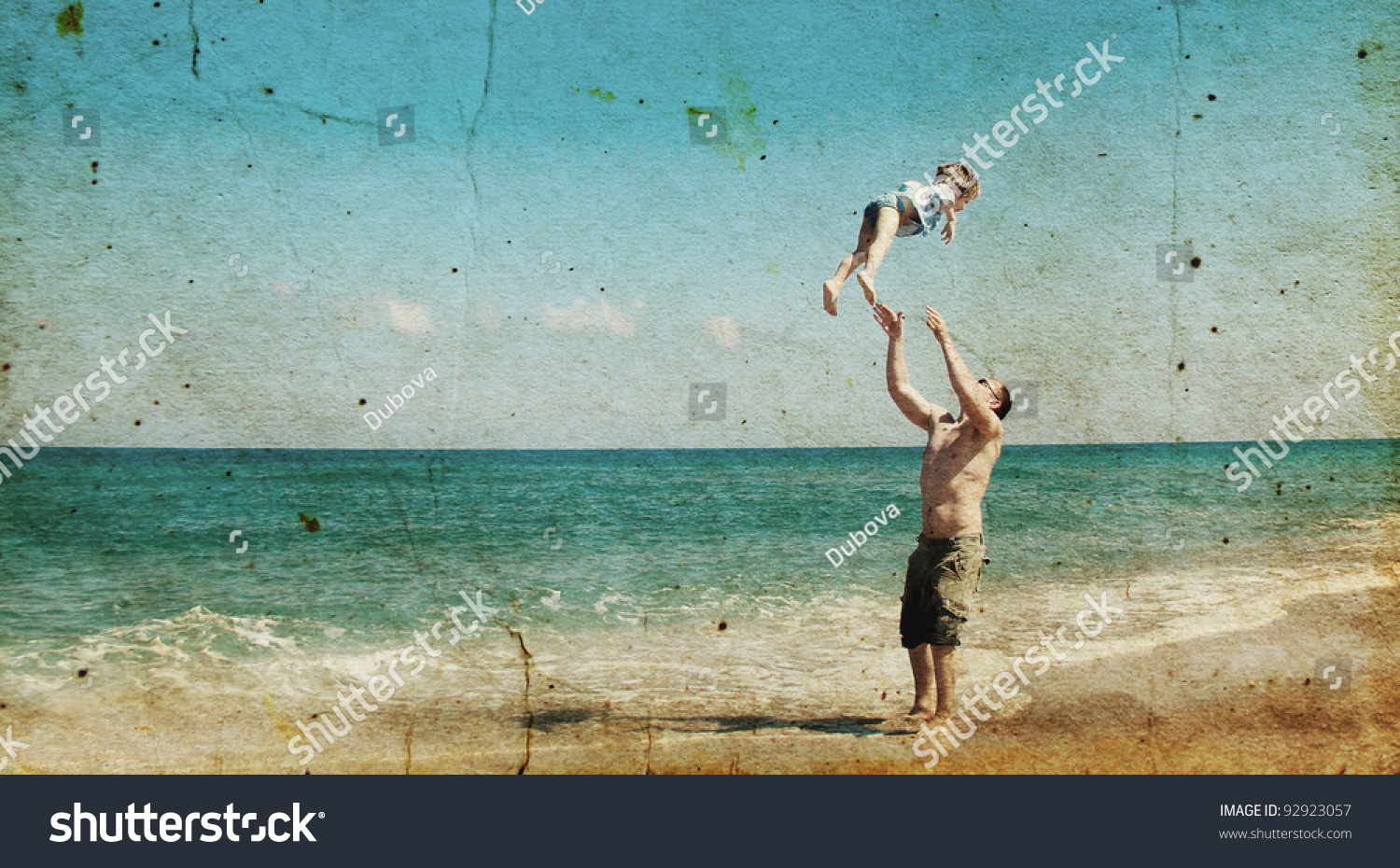 father and son playing together on the beach. Photo in old image style. #92923057