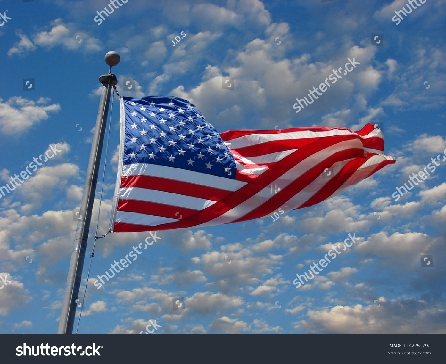 American Flag With Clouds In Background Stock Photo 42250792 : Shutterstock