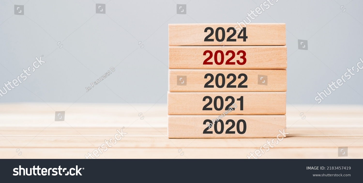 2024 Block Over 2023 2022 Wooden Stock Photo 2183457419 Shutterstock   Stock Photo  Block Over And Wooden Building On Table Background Business Planning Risk 2183457419 